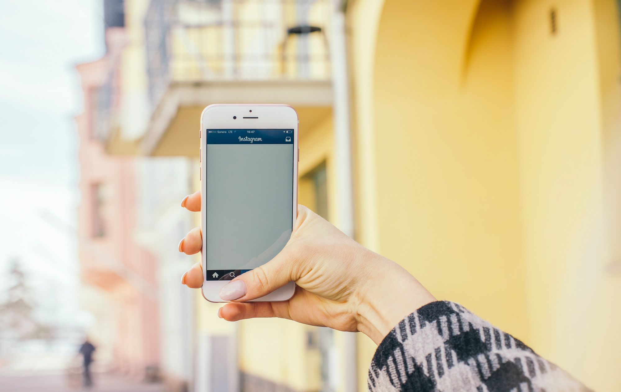 Stock photo of a selfie with a phone.