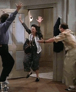 GIF of Seinfeld dancing and clapping excitedly.