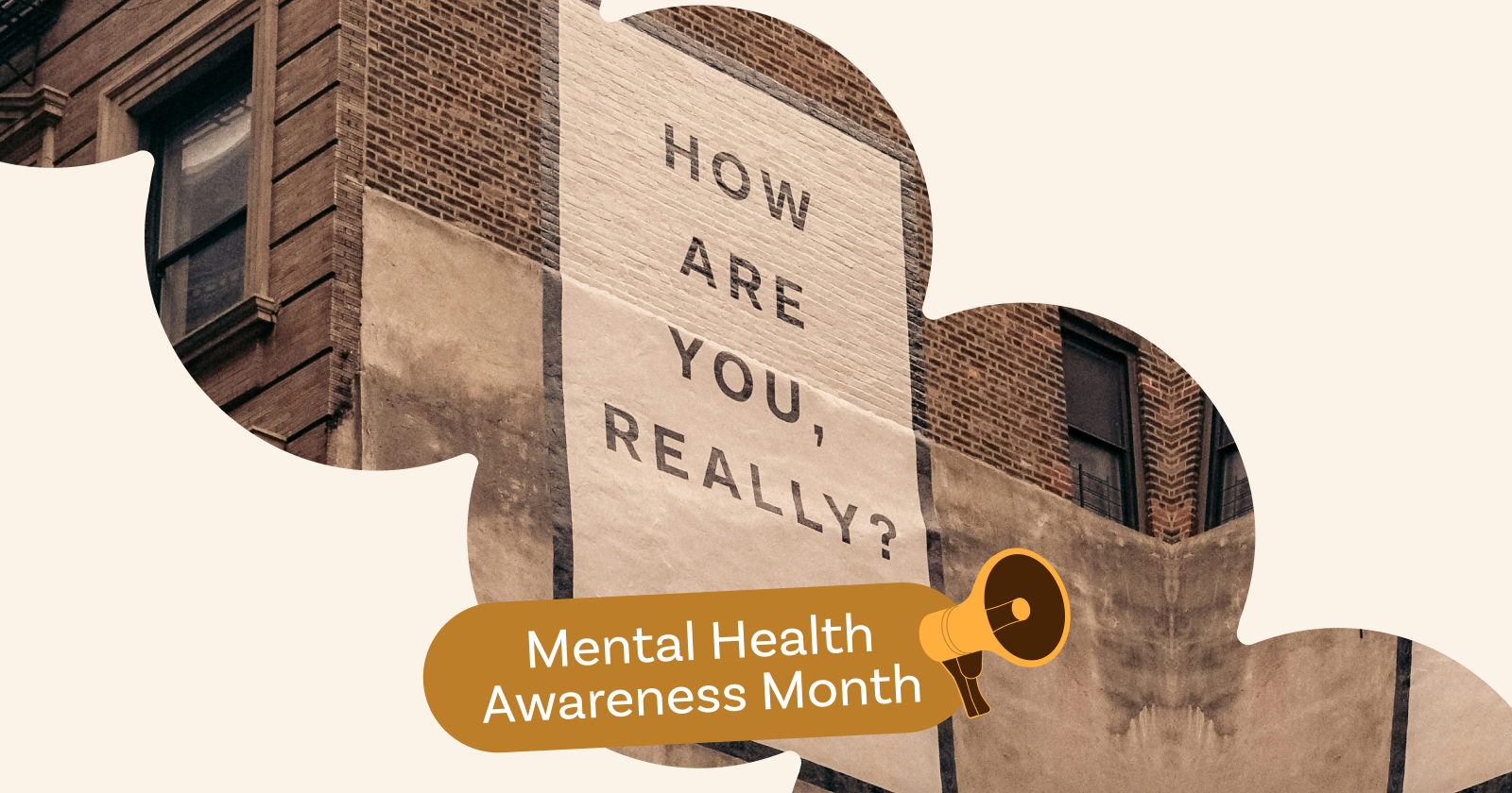 "Mural says 'How are you, really?' with 'Mental Health Awareness Month' banner."